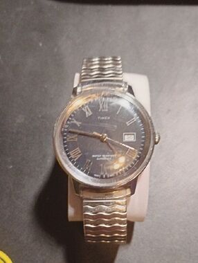Timex Silver Tone Watch with Black Dial and Gold Accents